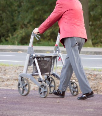 Older person with walker clipart