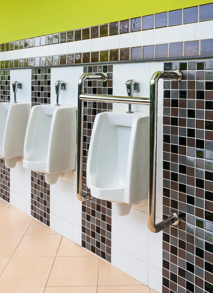 Porcelain Urinals for Cripple and Old People Royalty Free Stock Photos