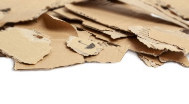 Cardboard scraps pile isolated on a white background