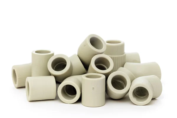 A lot of combined fittings for plastic pipes — Stock Photo, Image