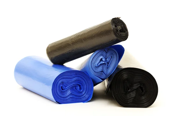 Garbage bags rolls on a white background — Stock Photo, Image