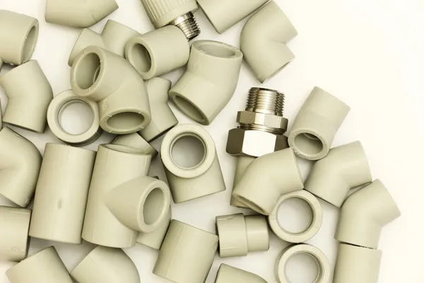 A lot of combined fittings for plastic pipes — Stock Photo, Image