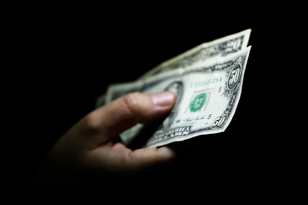 Dollar i en hand — Stockfoto