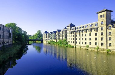 Capturing reflections in the River Kent, in August, 2022.