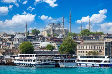 Bosphorus strait in Istanbul, Bosporus tour boats and views of Istanbul mosques and historic center.