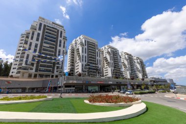 Bet Shemesh, Israel, 17 April, 2022: New Beit Shemesh commercial center with shops, banks, shopping malls and new residential buildings near newly built railway station