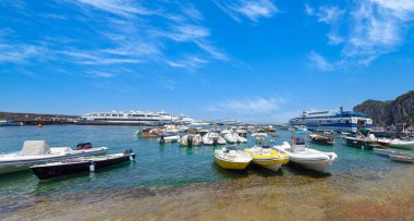 Capri, Campania, Italy, June 16, 2022: Italy, scenic views of Capri Island Bay. Ships yachts and ferries in Capri harbor