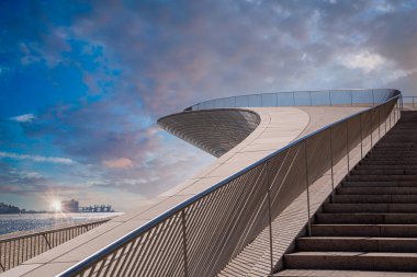 Portugal observation deck near Belem overlooking landmark suspension 25 of April bridge in Lisbon .