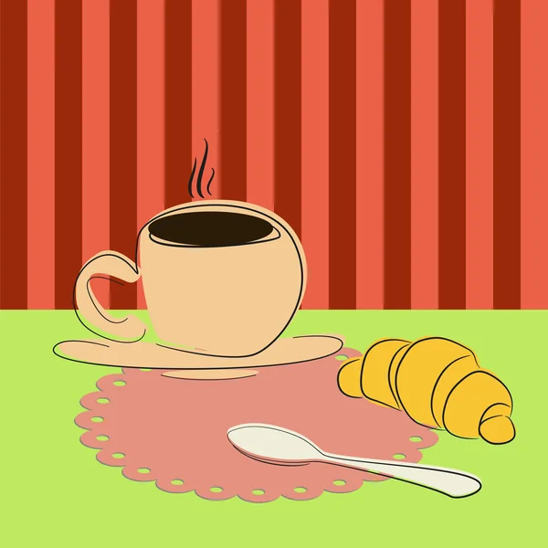 Masada bir fincan kahve ve kruvasan var.