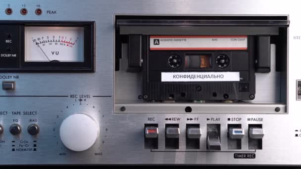 Audio Cassette Tape With Confidential Russian Recording in Vintage Deck Player — Stock Video