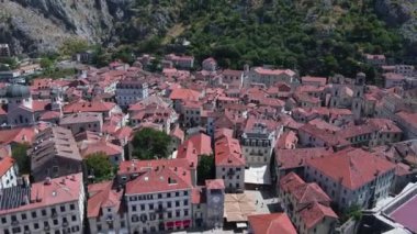 Kotor Old Town, Montenegro. Drone Aerial View of Stone Buildings in Fort of Bay at Adriatic Sea, Tourist Attraction, Drone Shot 4k