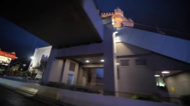 Las Vegas Strip at Night, Excalibur Hotel and Casino Buildings in Lights, Passenger POV From Moving Vehicle, Slow Motion 4k