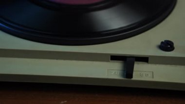Changing RPM Selector From 33 to 45 on Vintage Gramophone and Starting Vinyl Record, Close Up 4k