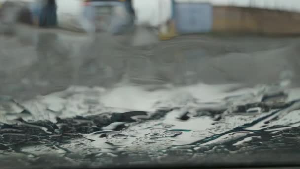 Raindrops Fall Glass Run Blurred Houses Passing Cars Visible Glass — Vídeo de Stock