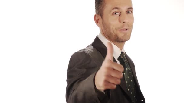 Красивый бизнесмен показывает большие пальцы вверх — стоковое видео