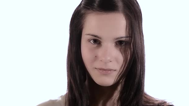 Portrait of a brunette girl with hand in the shape of a gun to her head — Stock Video