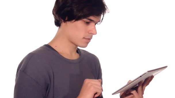 Young man working on his tablet computer — Stock Video