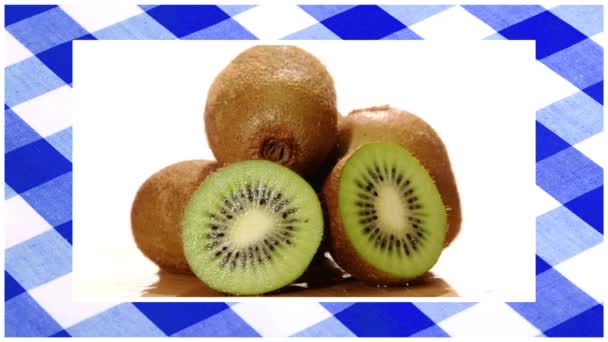 Diverse fruits edited sequence over blue tablecloth background — Stock Video