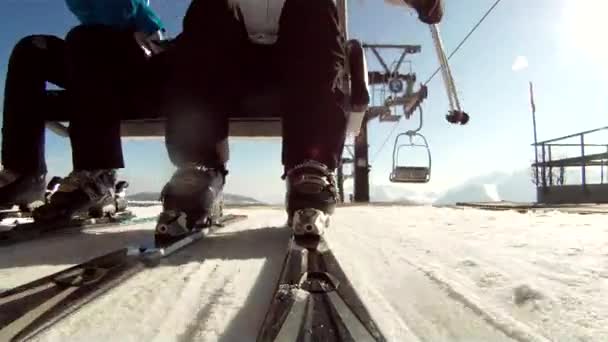 Getting on the chairlift — Stock Video