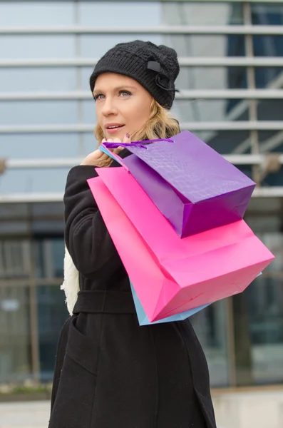 Young woman with shopping bags — Stock Photo, Image