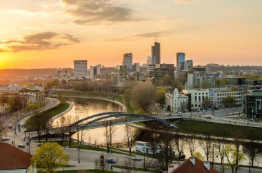 Lithuania. Beautiful golden Vilnius in the evening of the spring clipart