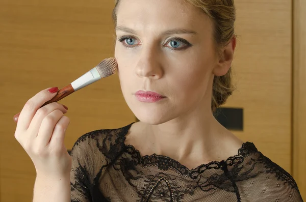 Young woman in make - up process — Stock Photo, Image