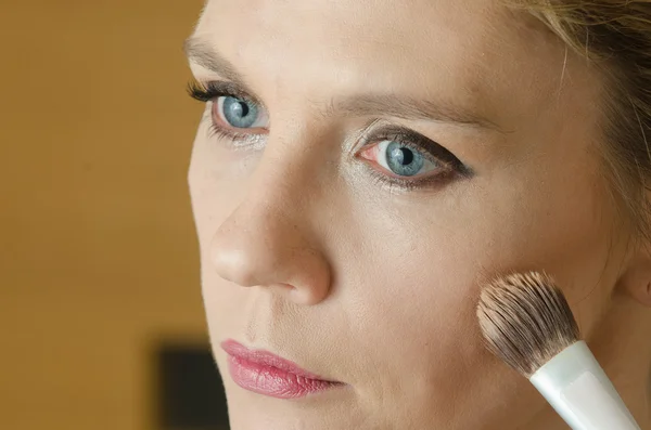 Young woman in make - up process — Stock Photo, Image