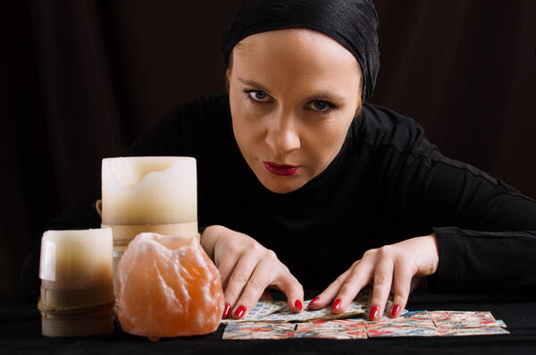 Young woman with divination cards