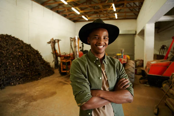 Mixed race female farmer standing with arms crossed — Stock Photo, Image