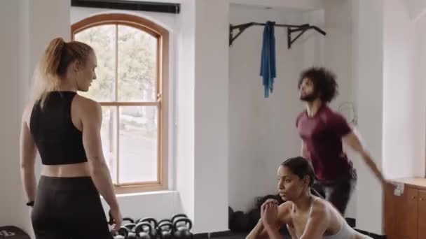 Diverse Group Individuals Group Exercise Class Being Coached Trainer Indoor — Vídeo de Stock
