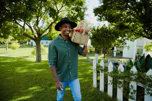 Mixed Race Male Farmer Walking Outdoors Smiling Holding Vegetables Basket — Stock Photo, Image