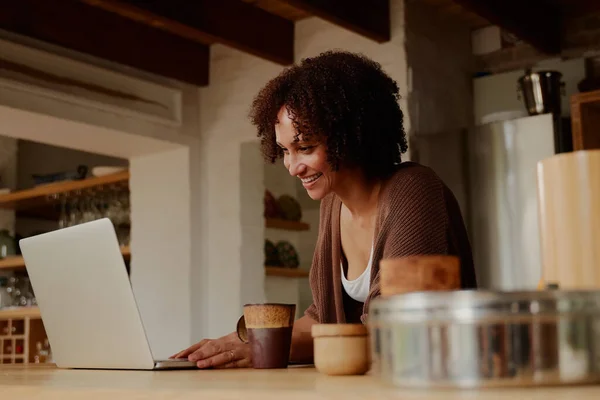 Young Biracial Woman Casual Clothing Smiling While Working Home Laptop — 图库照片