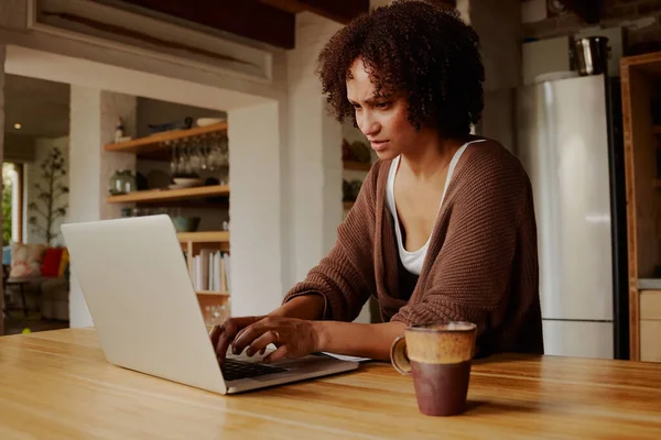 Focused Biracial Young Woman Casual Clothing Working Laptop Kitchen Home — Fotografia de Stock