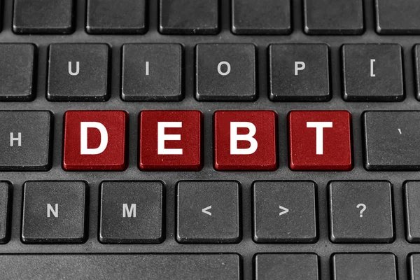 Debt word on keyboard — Stock Photo, Image