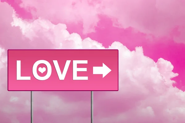 Love on pink road sign — Stock Photo, Image