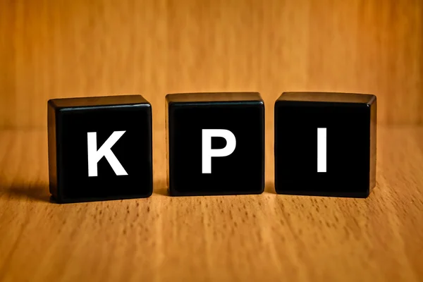 KPI or Key Performance indicator text on block — Stock Photo, Image