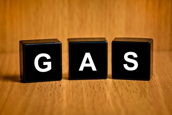 Gas tekst op zwart blok — Stockfoto