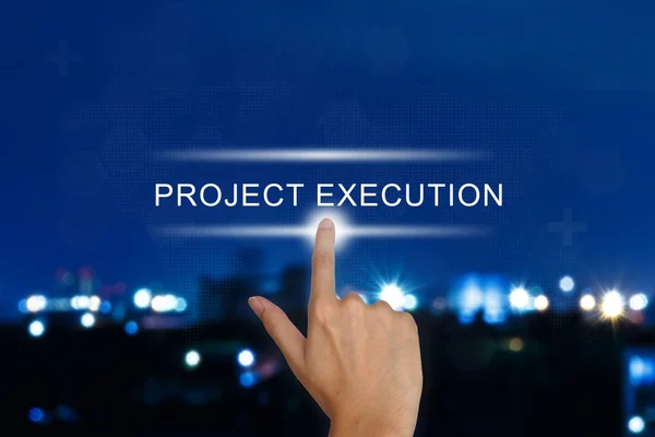 Hand pushing project execution button on touch screen — Stock Photo, Image