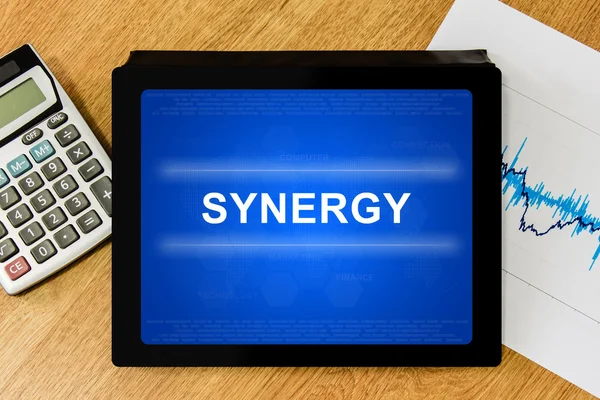 Synergy word on digital tablet — Stock Photo, Image