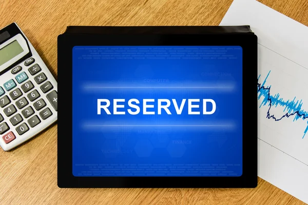 Reserved word on digital tablet — Stock Photo, Image