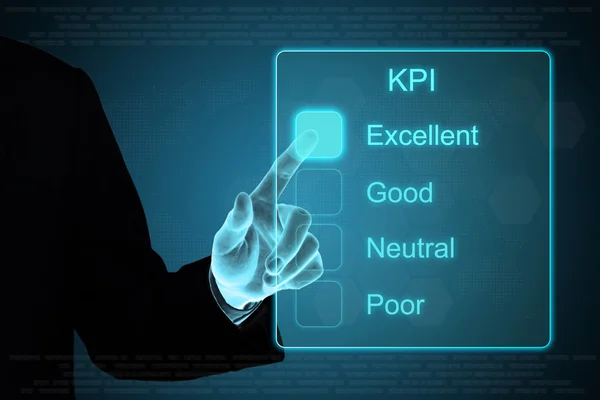 Бизнес-рука кликает KPI на сенсорном экране — стоковое фото