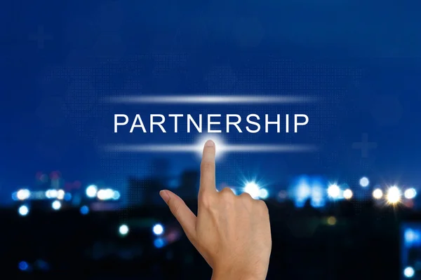 Hand pushing partnership button on touch screen — Stock Photo, Image
