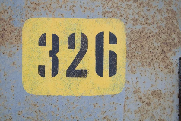 Rust metal background with numbers — Stock Photo, Image