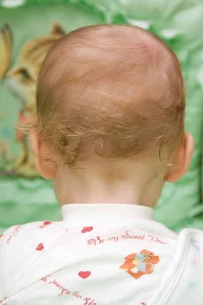 Baby zurück — Stockfoto