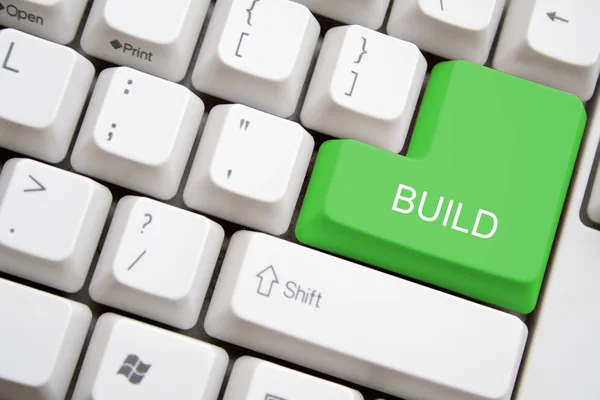 Keyboard with green BUILD button — Stock Photo, Image