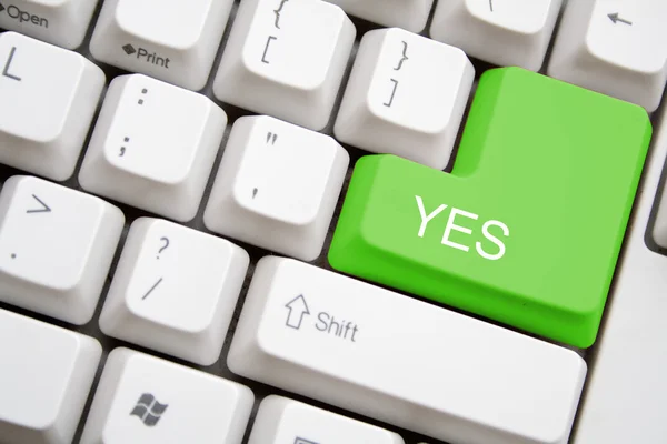 Keyboard with green YES button — Stock Photo, Image