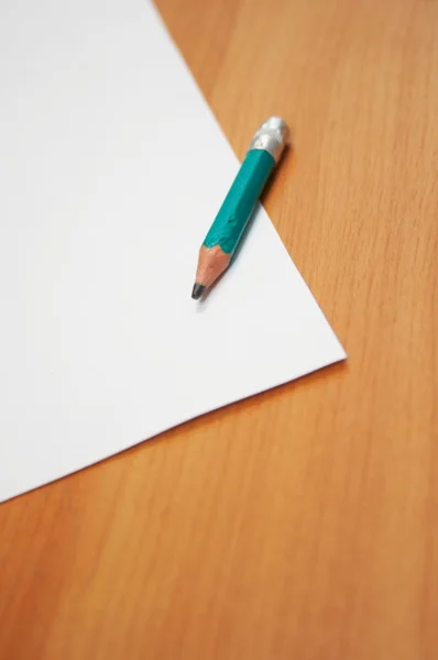 Paper and pencil over the desk — Stock Photo, Image