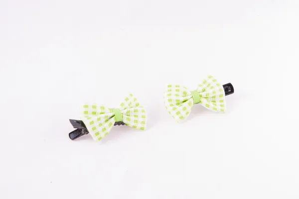 Green clip for women white background — Stock Photo, Image