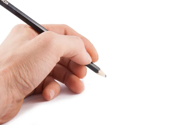 Black pen in a left hand on white background — Stock Photo, Image