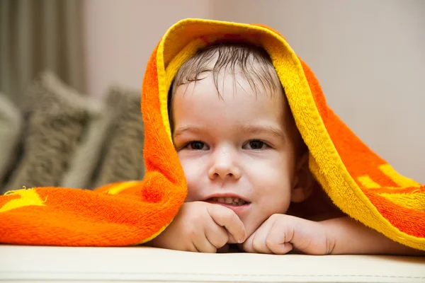 Baby after the bath under towel — Stock Photo, Image